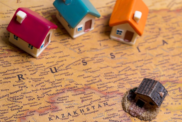 A detailed shot of a property tax bill overlaid on a map of a residential neighborhood, symbolizing the importance of understanding local tax regulations.