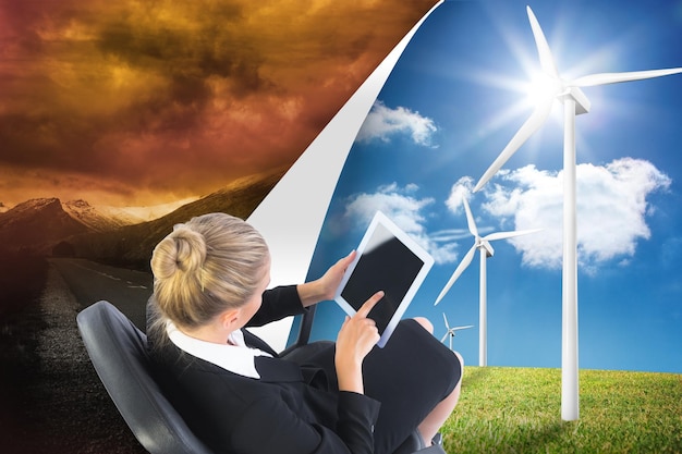 A split screen showing a wind turbine farm on one side and a solar panel array on the other, representing the two main renewable energy sources being debated.